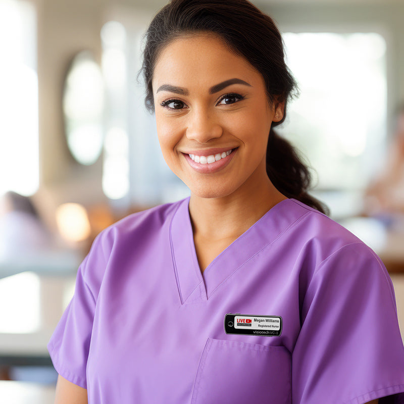 Healthcare professional wearing the VC1 Pro body-worn badge camera